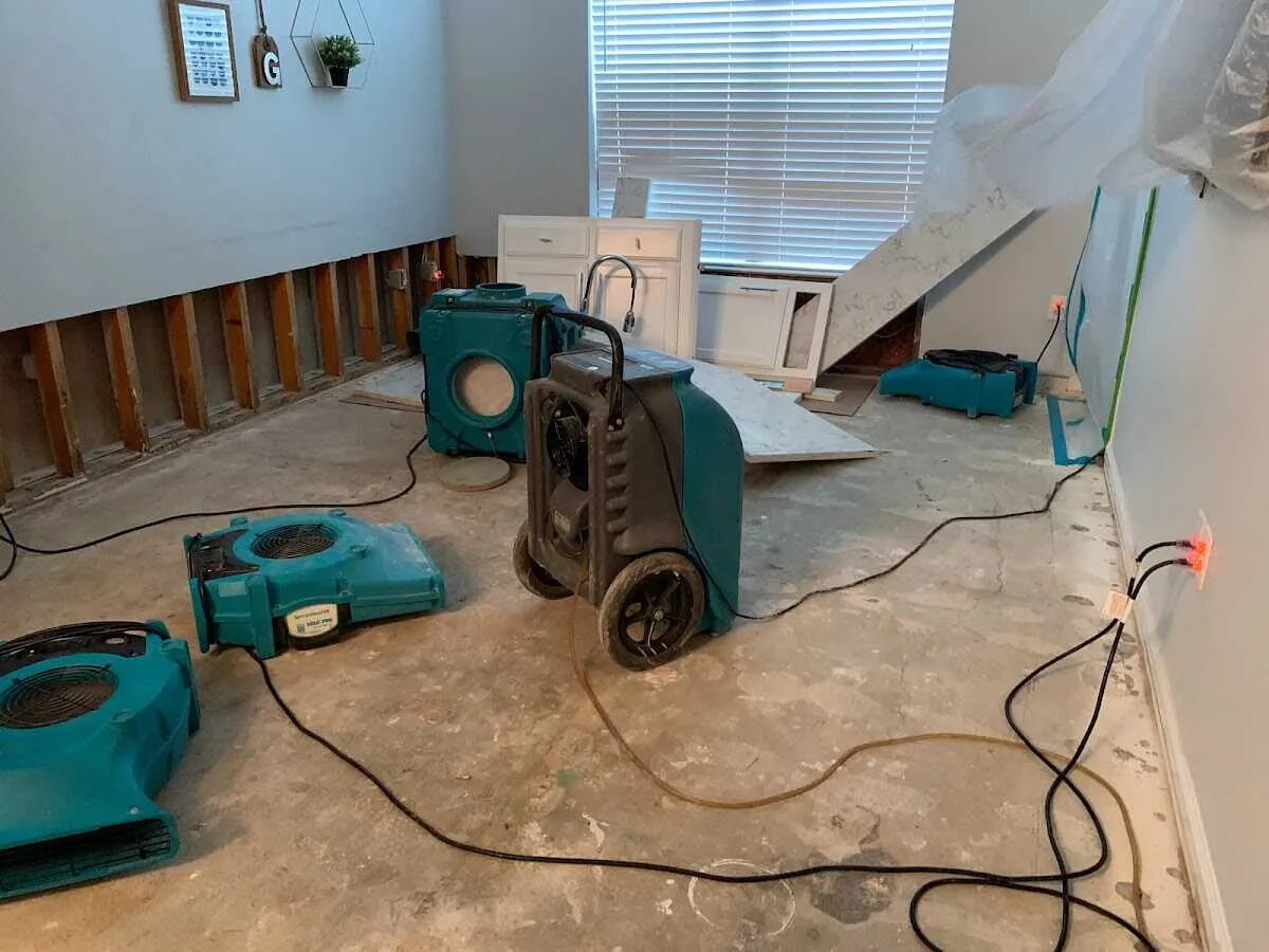 Dehumidifier in flood-cut room for Water Damage Restoration in Greendale